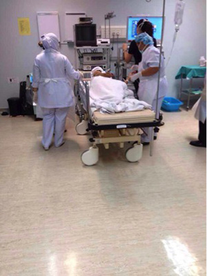 Figure 2: A patient being prepped for OGDS in the center that I am working in. The older model is to the left of the picture with the black TV screen. The newer model is purely for experimental usage.