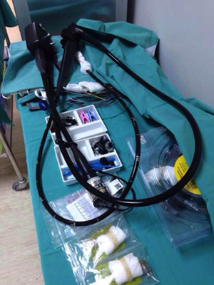 Figure 3: A flexible older generation OGDS (or also known as upper endoscope) on display in my center alongside intervention tools and other OGDS paraphernalia.